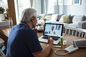 nurse showing test results to patients